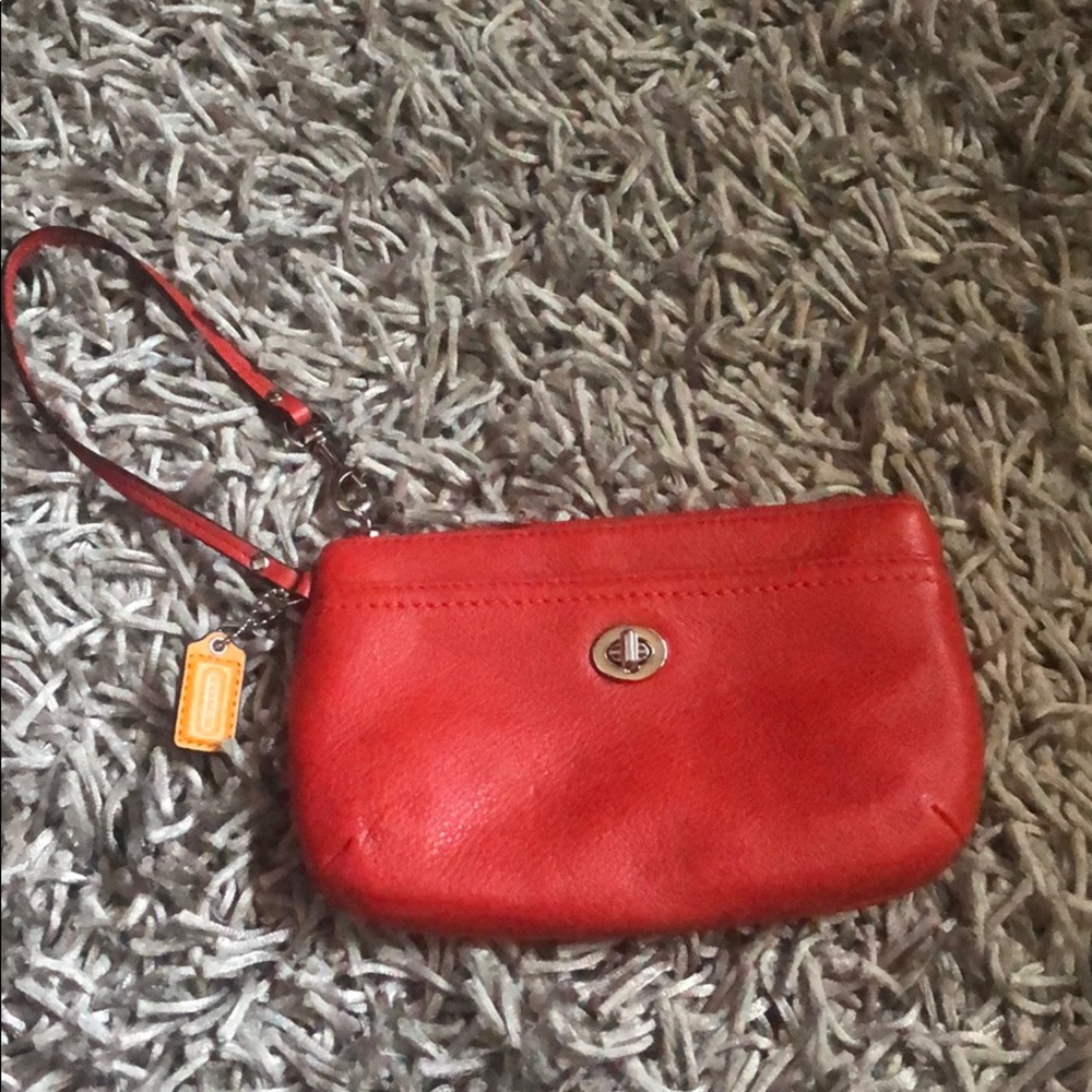 NWOT Bright Orange Coach Wristlet